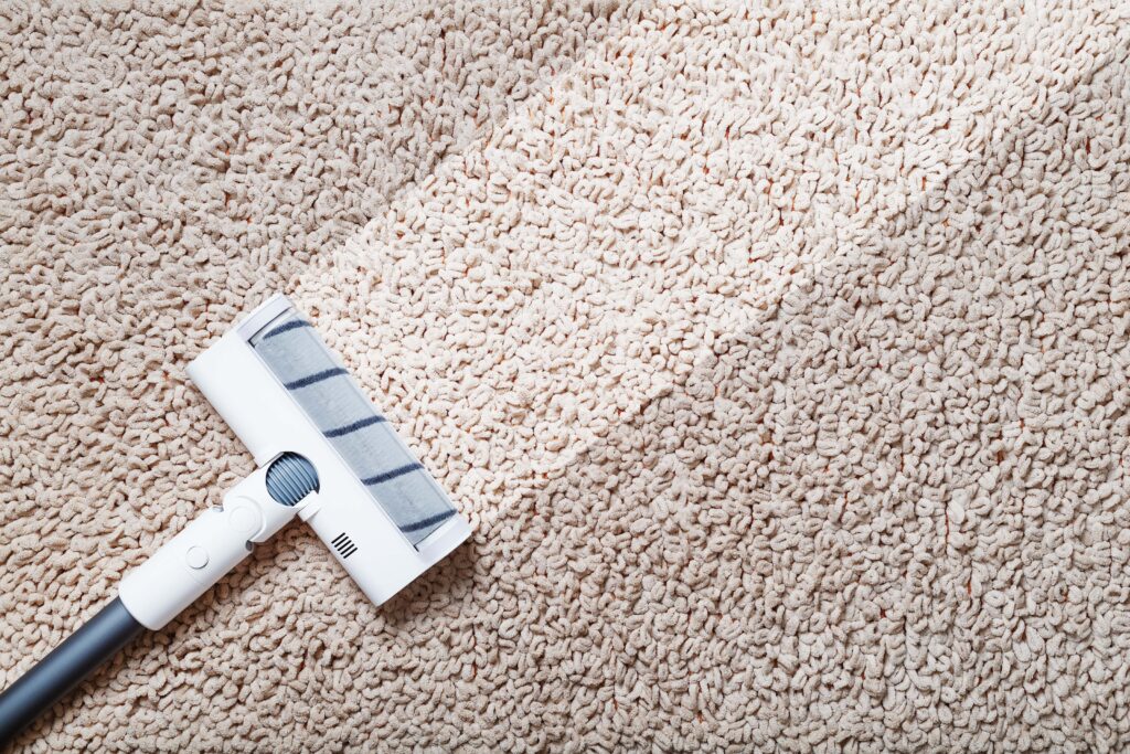 human-legs-white-turbo-brush-cordless-vacuum-cleaner-cleans-carpet-house-modern-technologies-cleaning-min