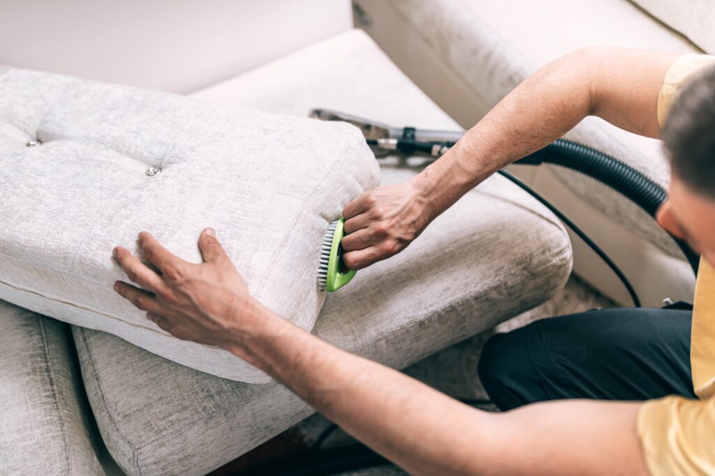 process-deep-furniture-cleaning-removing-dirt-from-sofa-washing-concept-min